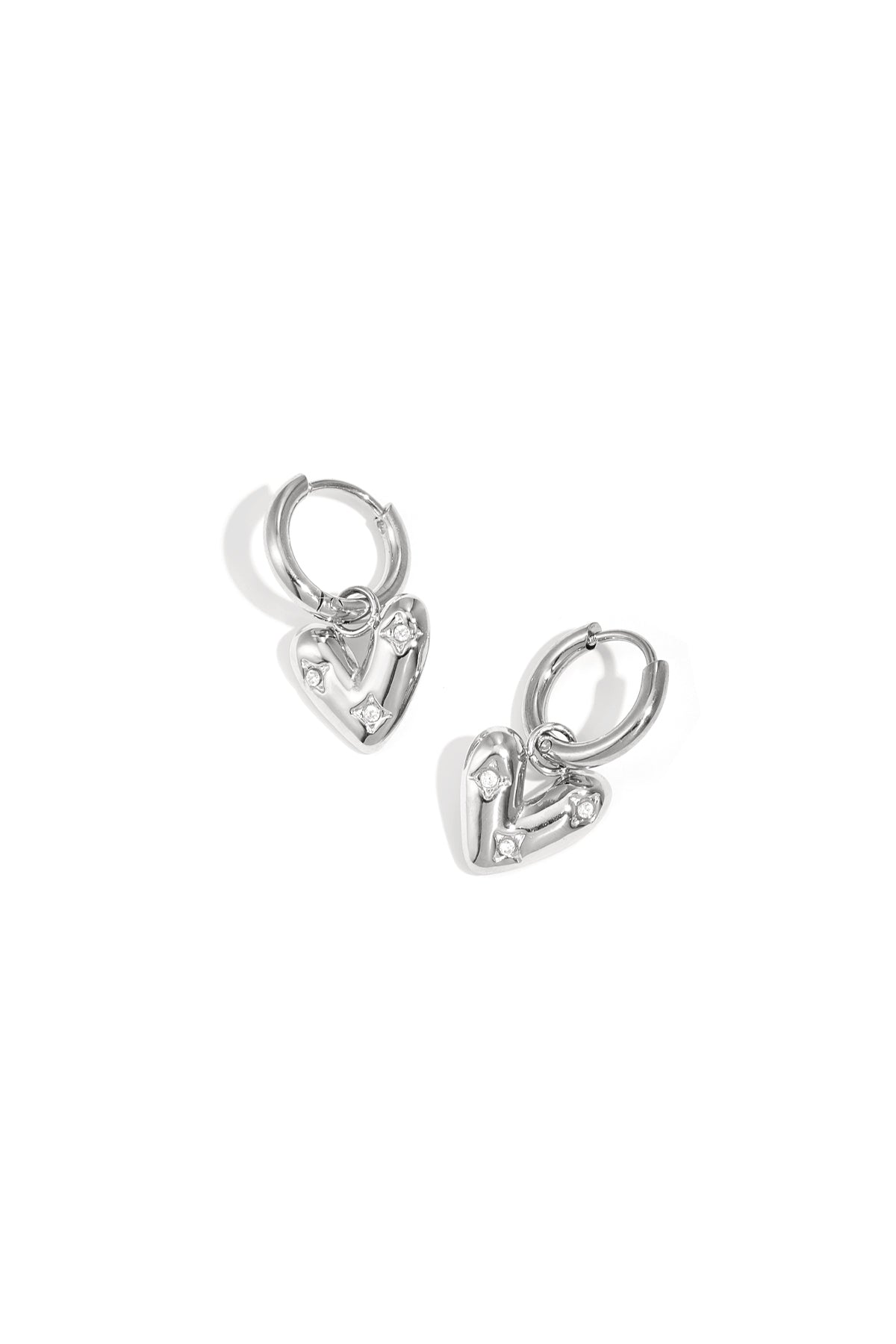 Earrings with heart-shaped pendant and zircon
