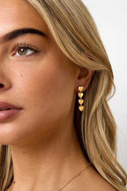 Row of heart earrings